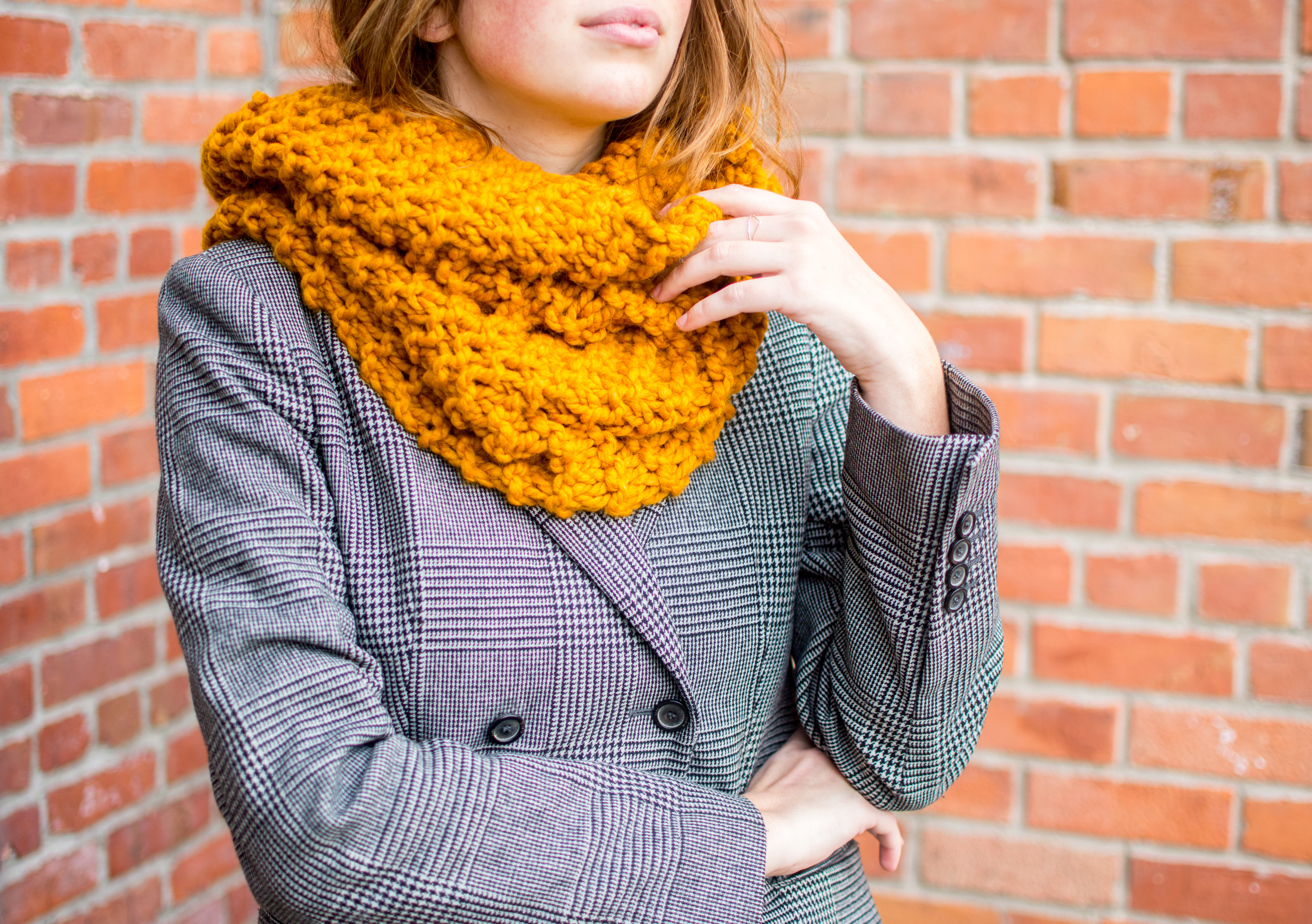 Cozy hand-knit scarf by Squeak & Moon, $79